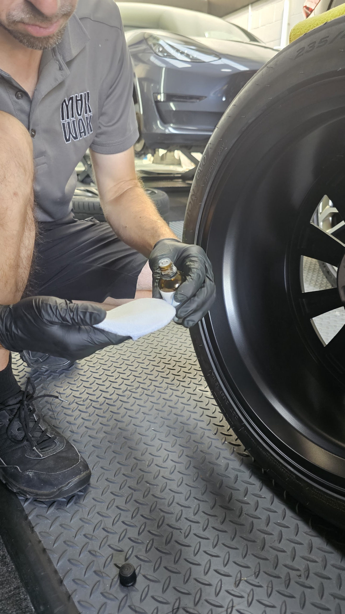 Ceramic coating going on with a soft applicator pad at the MAX WAX Shoreham workshop