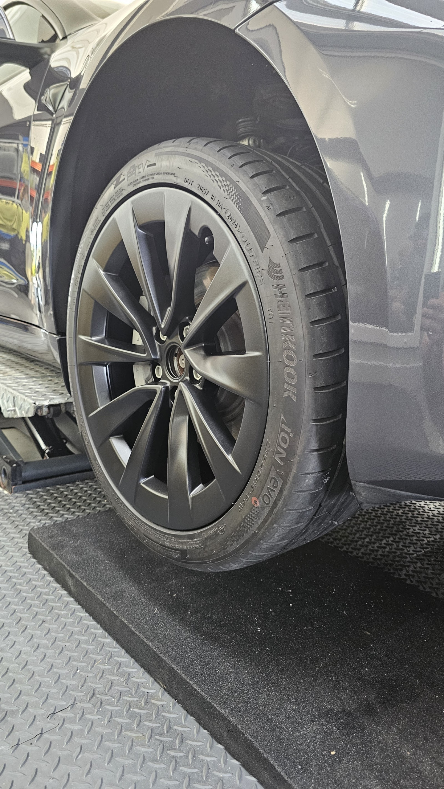Alloy wheel refurbishment finished in satin black - ceramic coated and back on the car