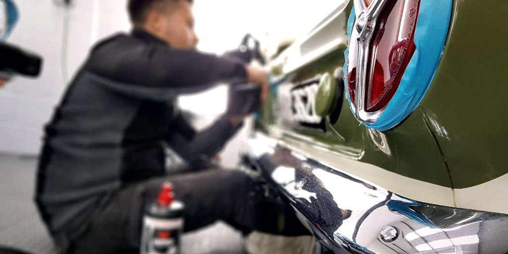 MAX WAX technician nano polishing intricate areas of a car