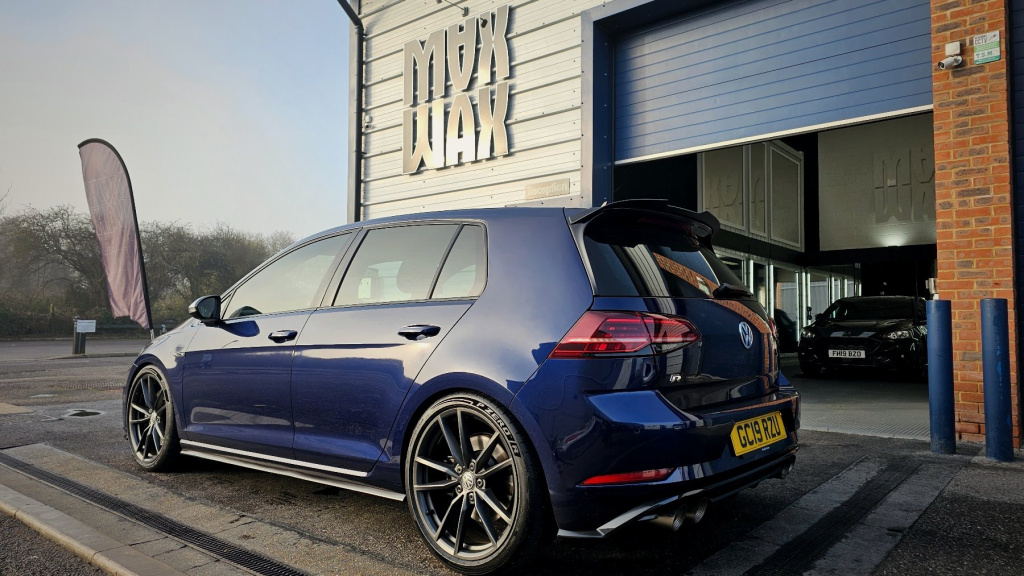 Blue Volkswagen Golf outside the MAX WAX studio
