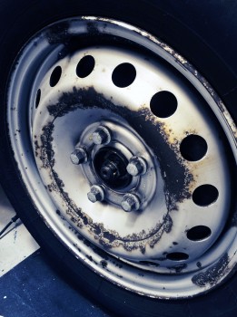 Van wheel before cleaning - brake dust and grime